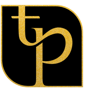 A sleek, modern photo booth with a circular light and tablet, set up against a floral backdrop.