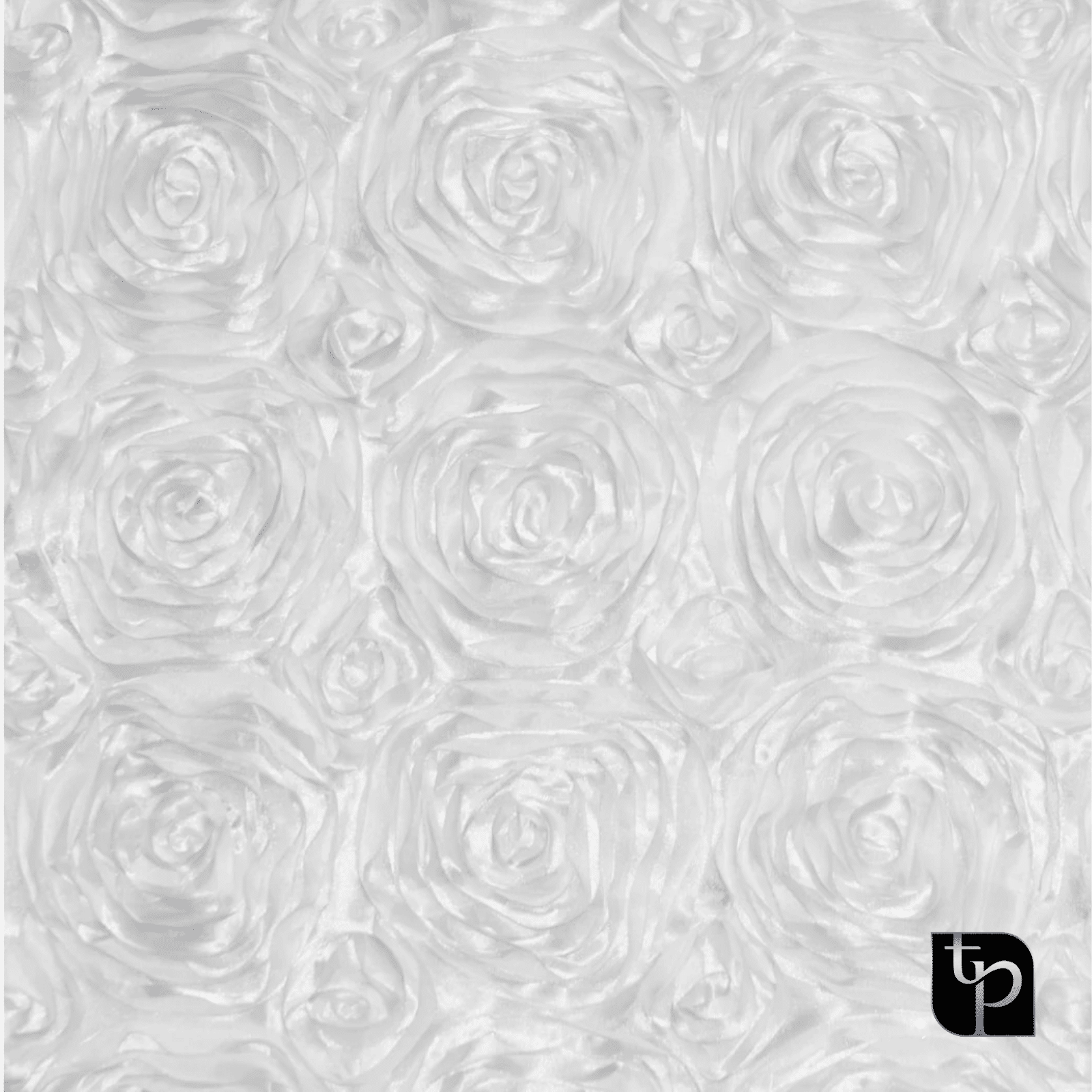 White floral backdrop featuring textured rose patterns, ideal for enhancing photography settings, with The Phototique logo in the corner.