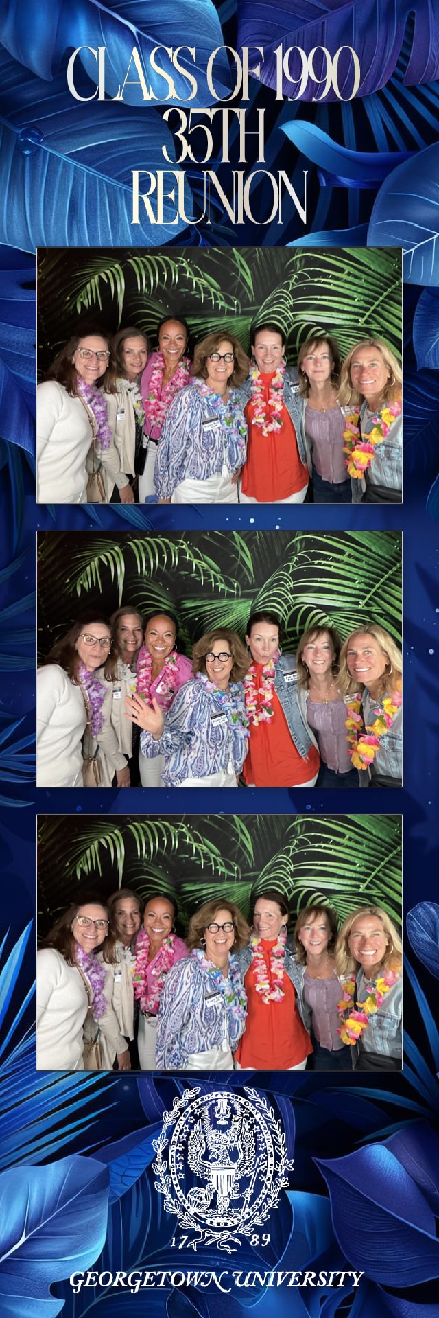 A group of people smiling and posing for a picture at a university reunion event, holding custom props and a branded sign.
