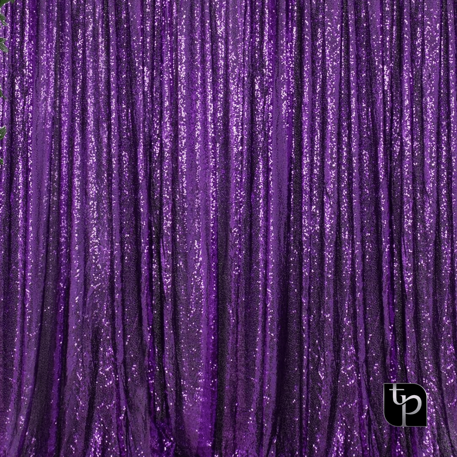 Purple sequined backdrop with shimmering texture, ideal for enhancing photography settings, showcasing The Phototique's diverse backdrop options.