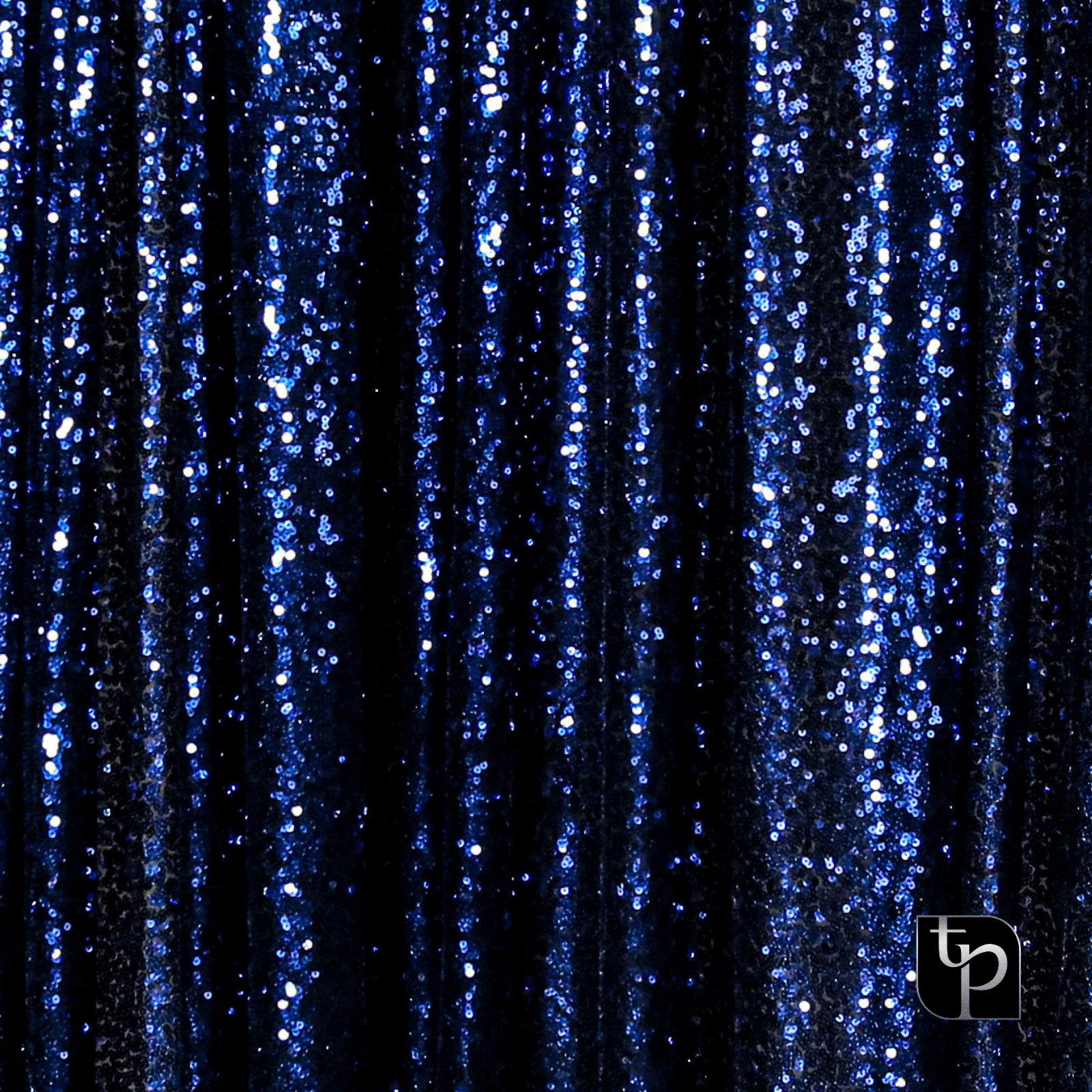 Blue sequin backdrop with shimmering texture, ideal for enhancing photo shoot settings, featuring a sleek design from The Phototique.