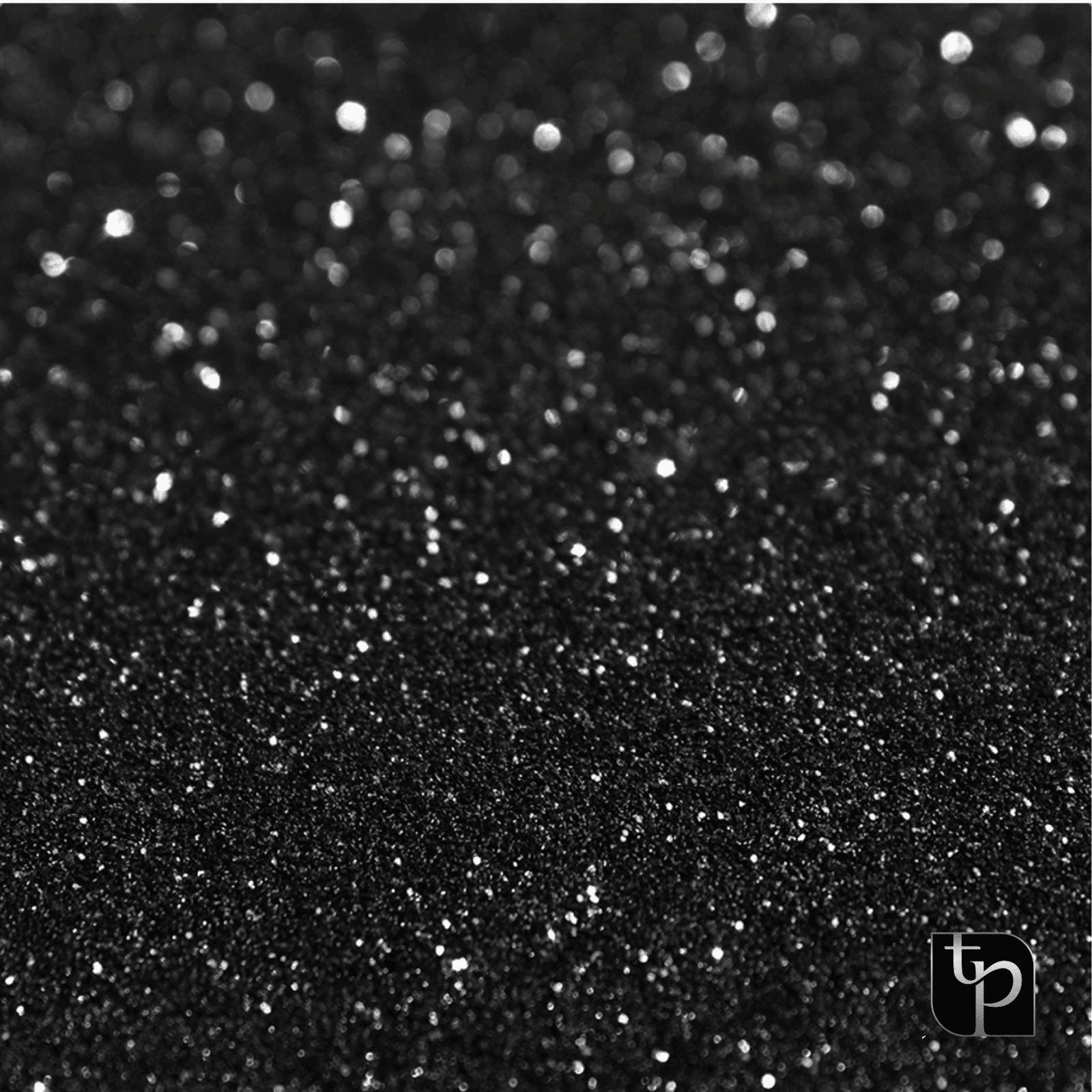 Black glitter backdrop with shimmering effects, enhancing photography settings for diverse shoots, featuring The Phototique logo in the corner.