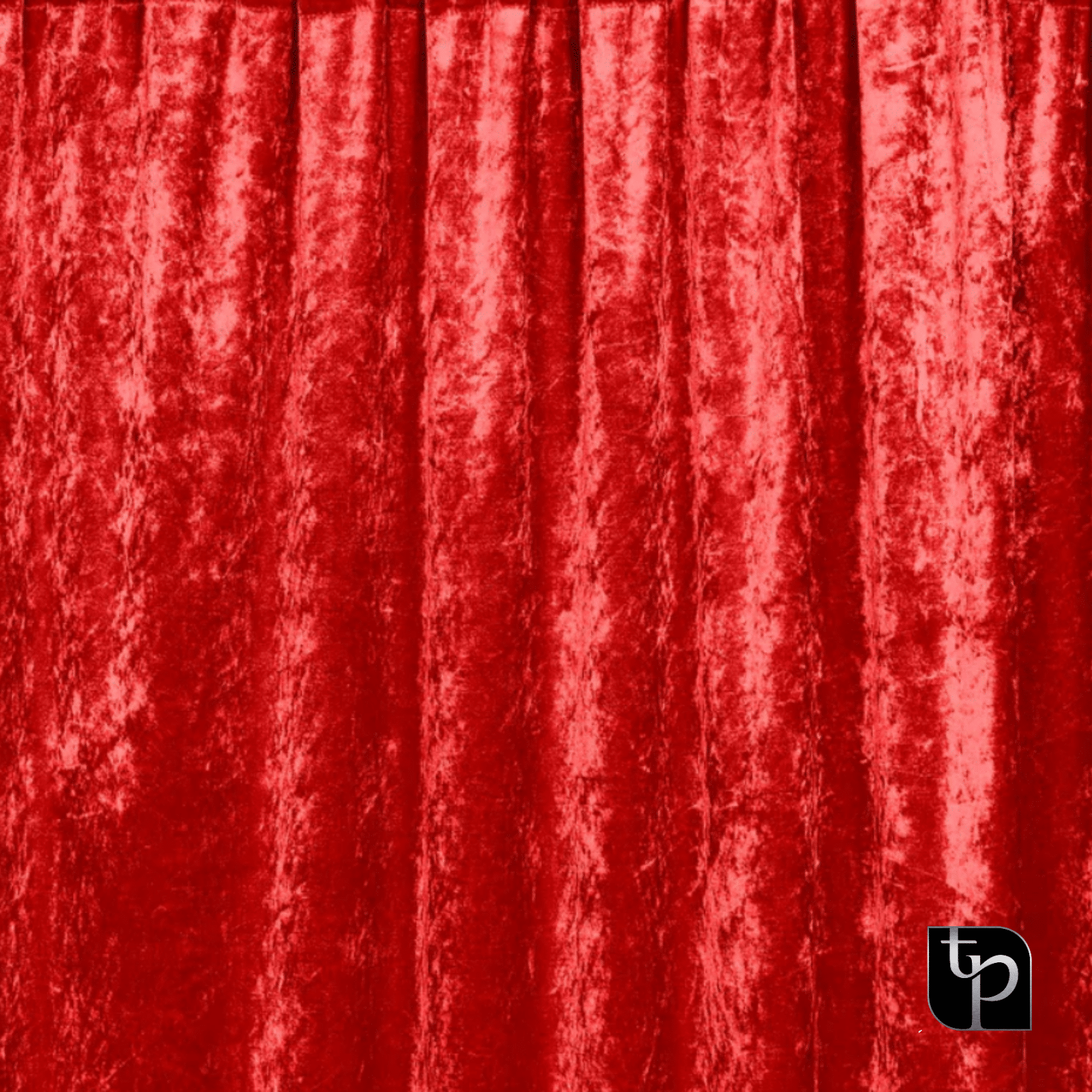 Red velvet backdrop with textured folds, showcasing a rich color ideal for enhancing photography settings, featuring The Phototique logo.