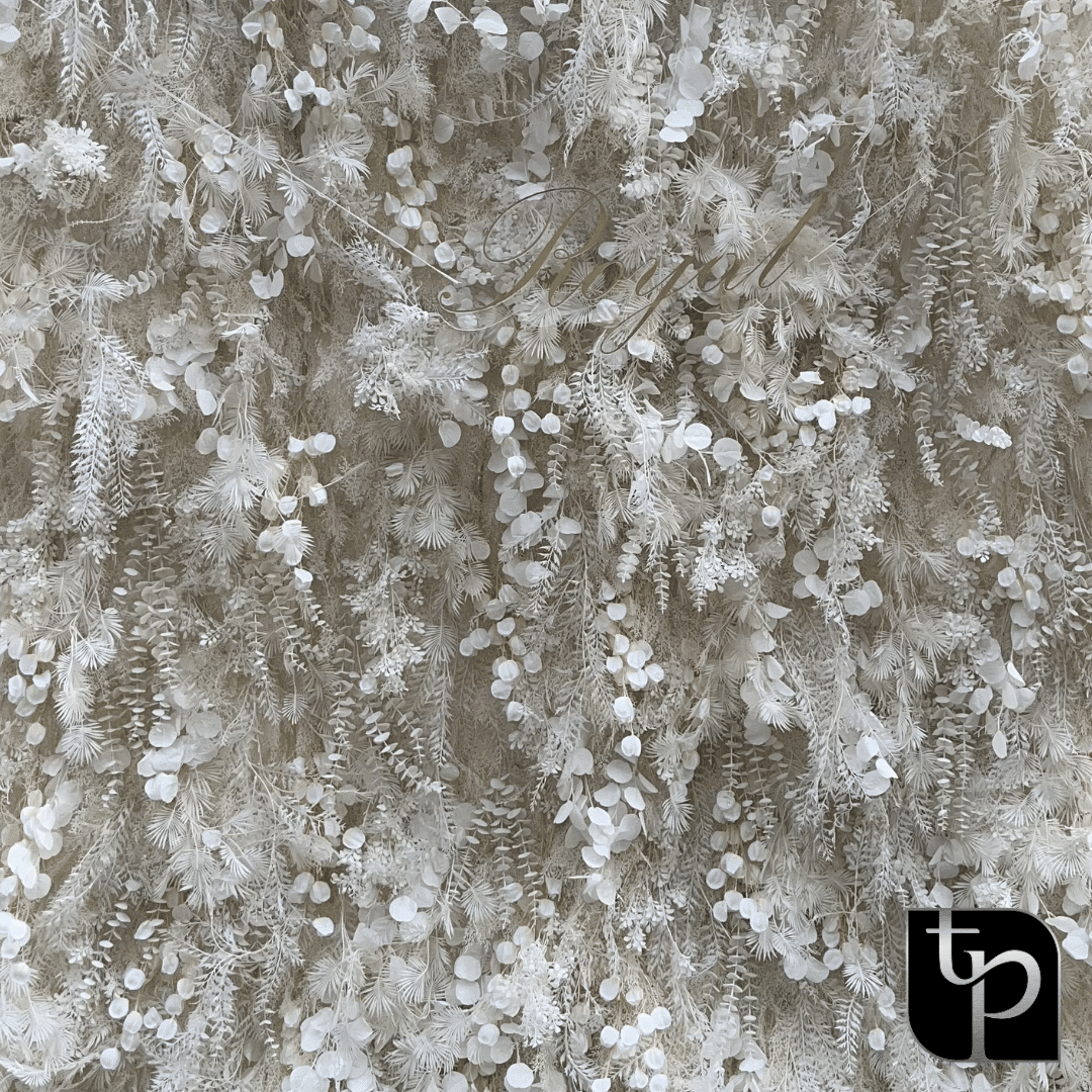 White floral backdrop with intricate textures and patterns, featuring leaves and blossoms, branded with The Phototique logo.