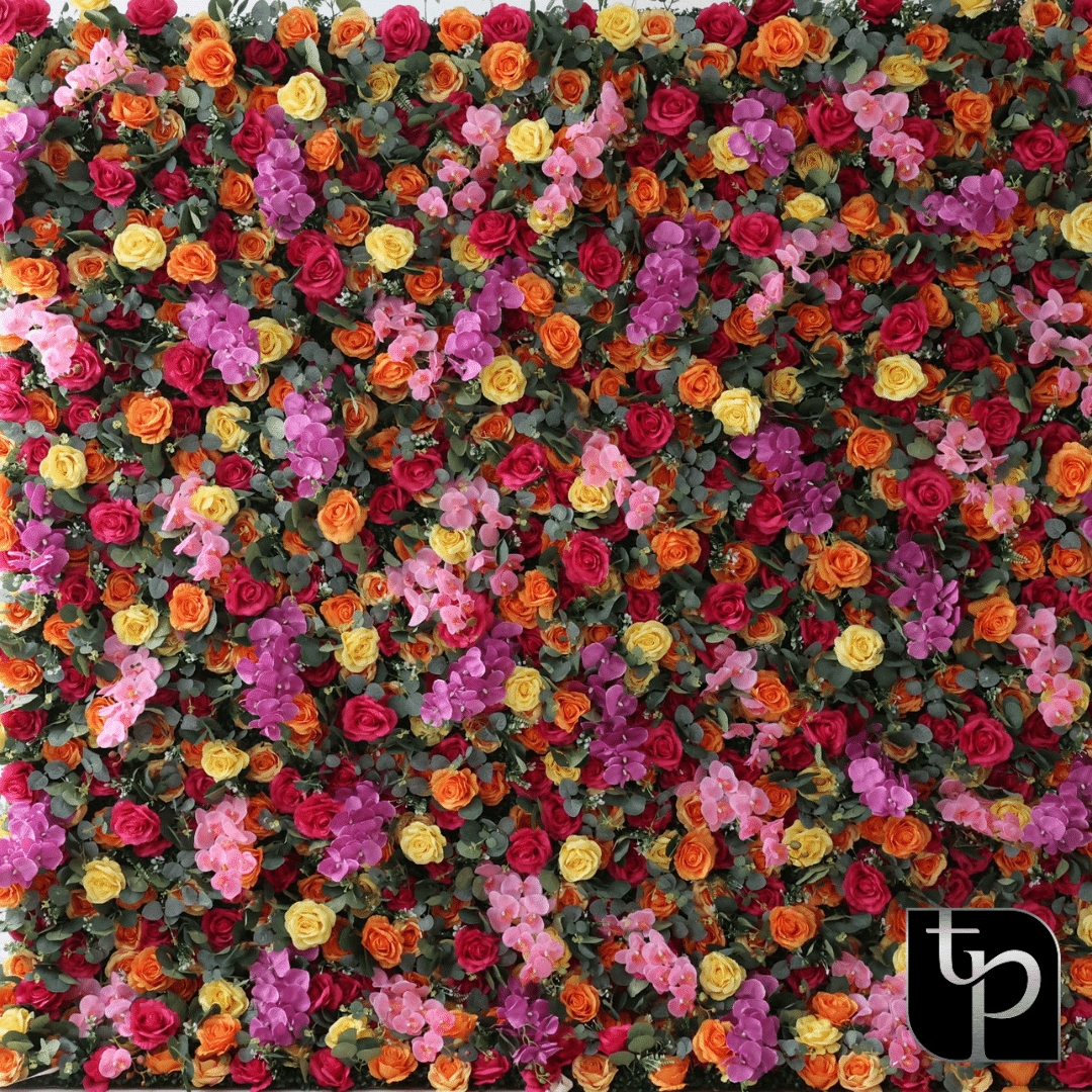 Colorful floral backdrop featuring a mix of roses in shades of red, orange, pink, and yellow, alongside purple orchids, ideal for enhancing photography settings.