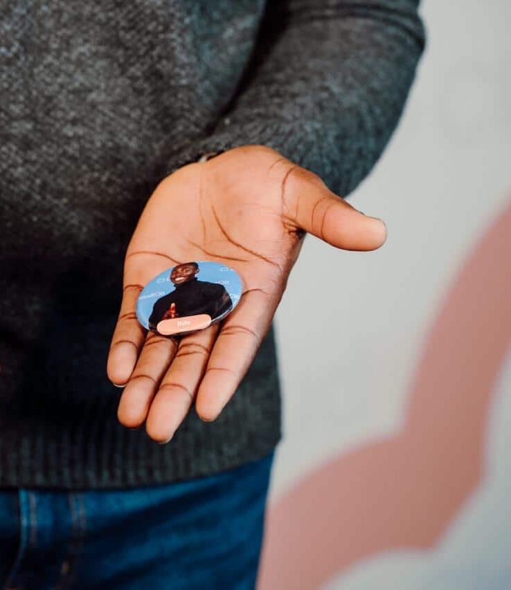 photo of hands with buttons