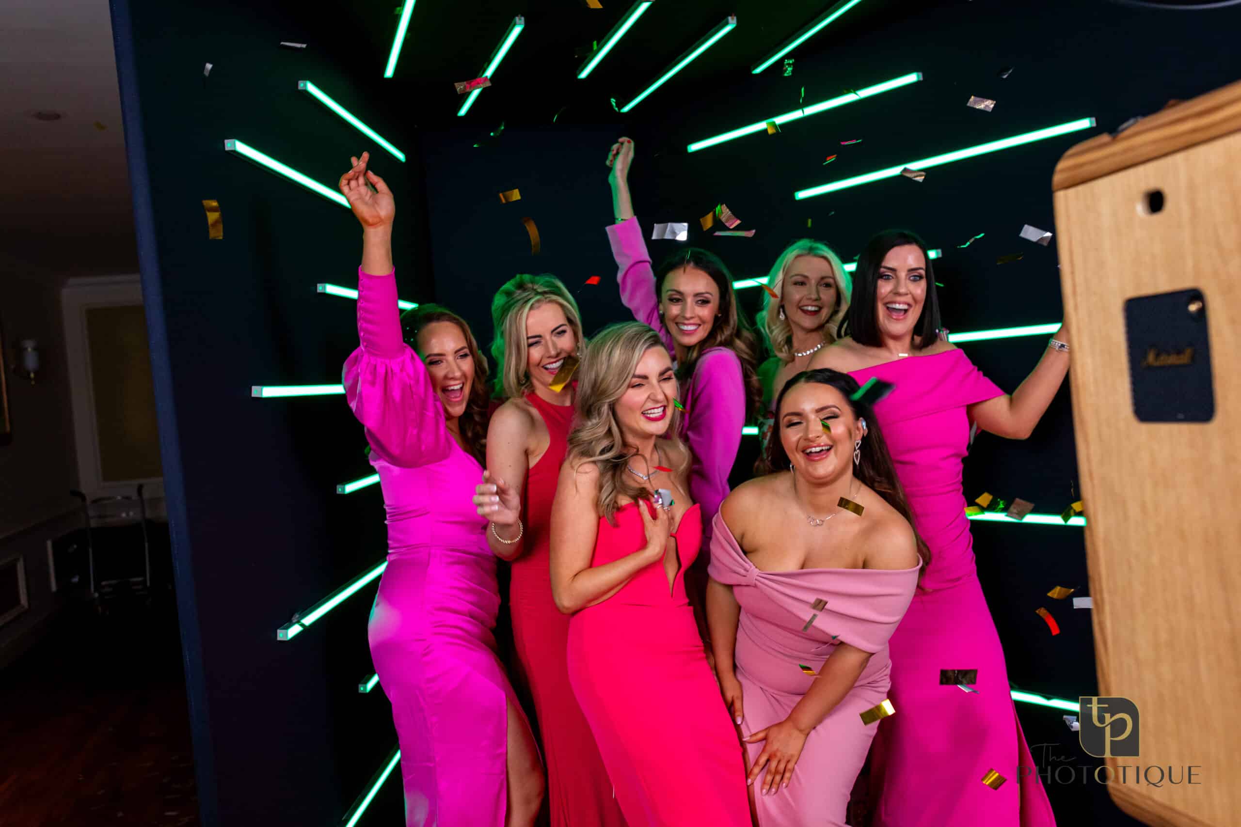 women in the vogue LED photo booth at a gala in washington dc