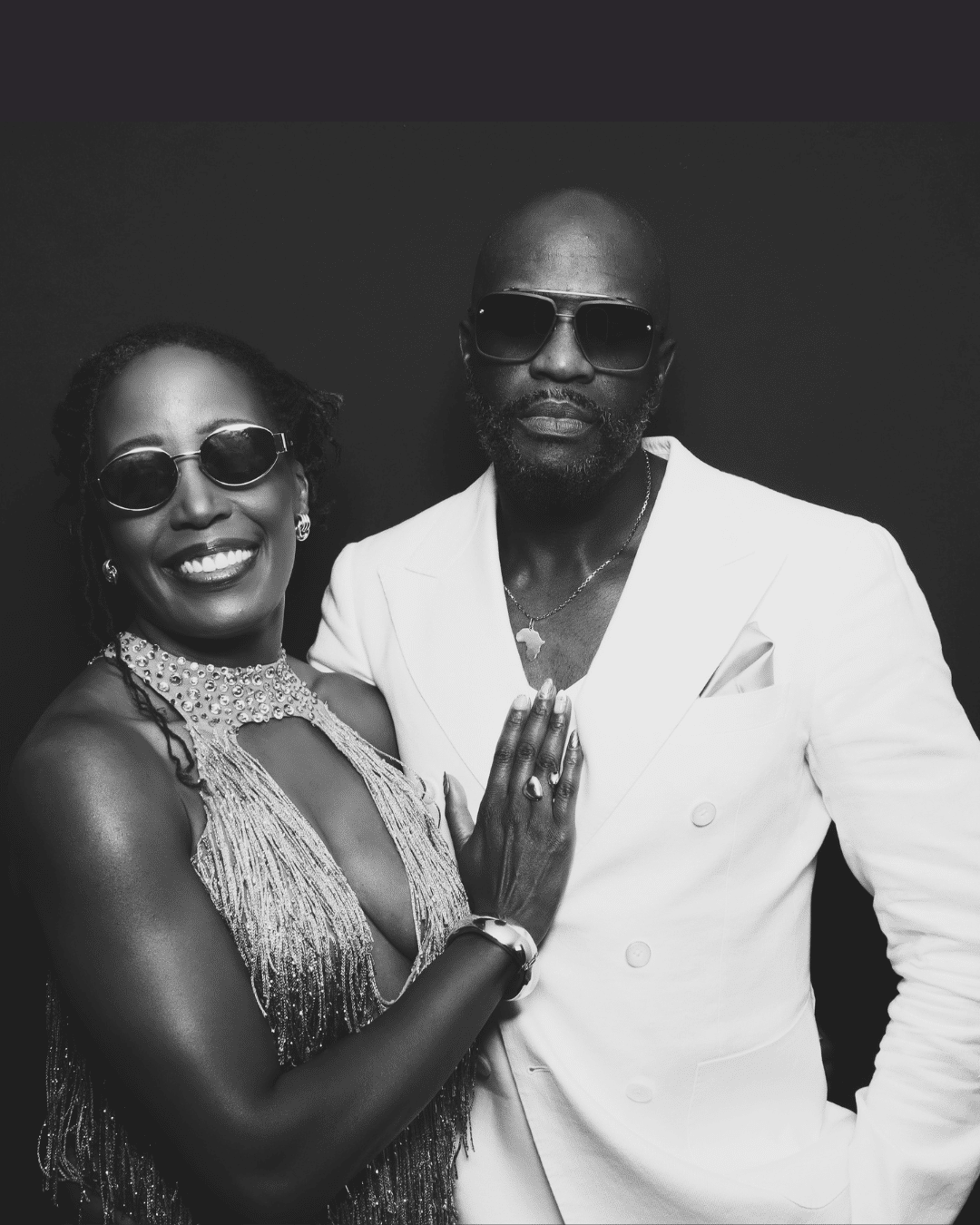 A Washington DC couple poses for a black and white photo for the photo booth.