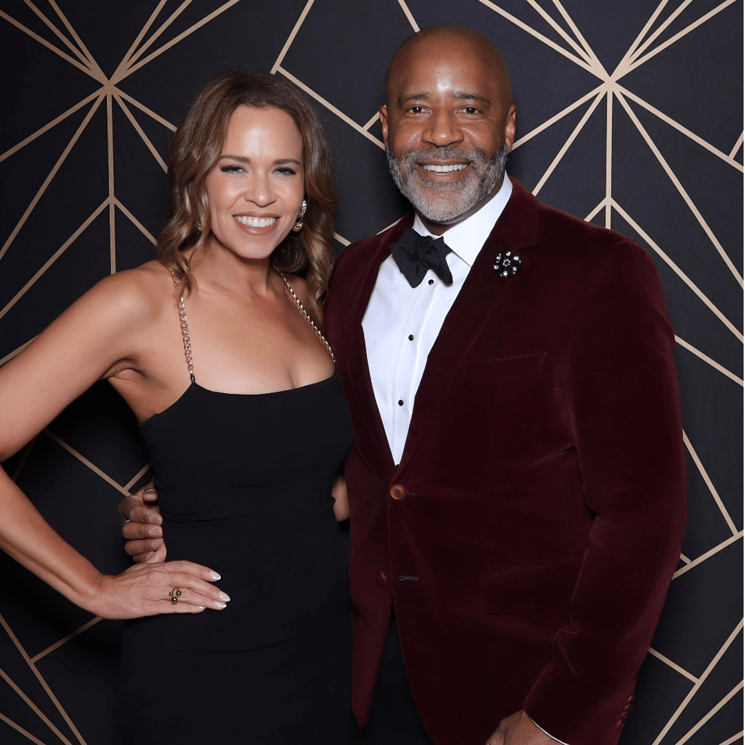 A couple poses for the photo booth at dc holiday gala